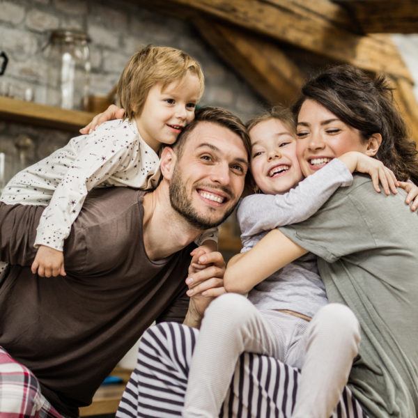 Young loving family enjoying their morning at home.