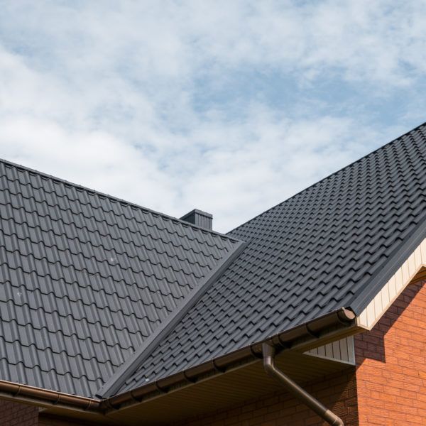 close up of roof with modern, metal shingles