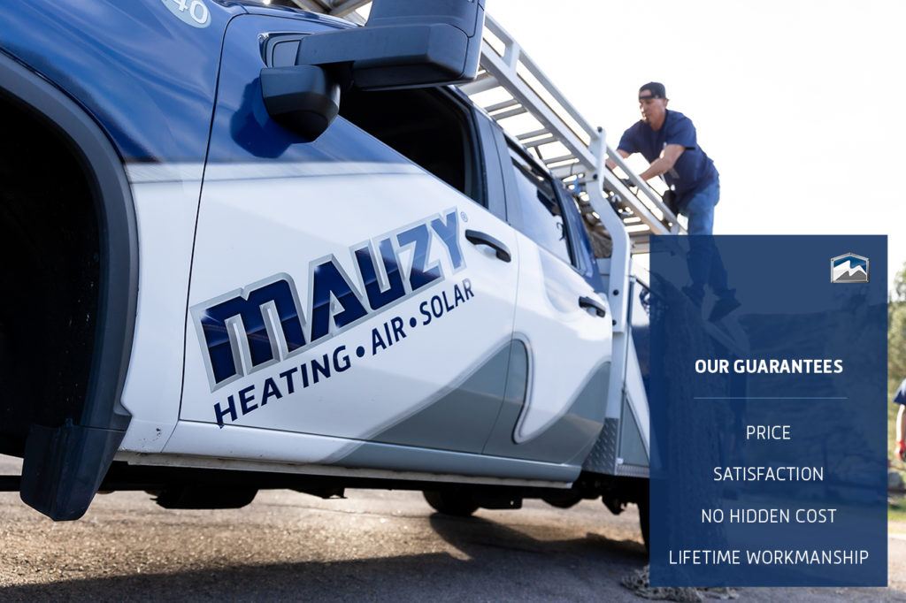 mauzy installer working on a truck